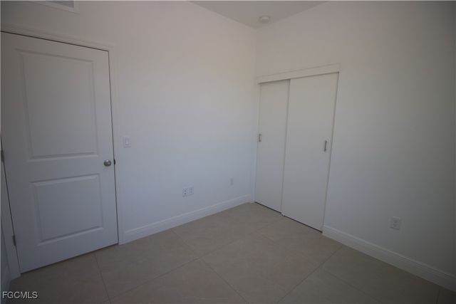 1260 MILWAUKEE BLVD 1260, Lehigh Acres, FL 33974