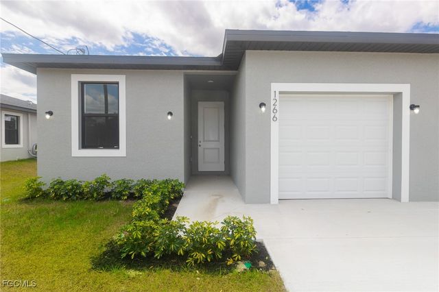 1260 MILWAUKEE BLVD 1260, Lehigh Acres, FL 33974