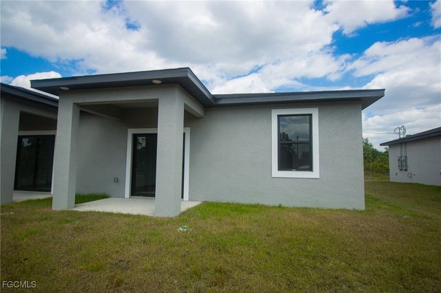 1260 MILWAUKEE BLVD 1260, Lehigh Acres, FL 33974