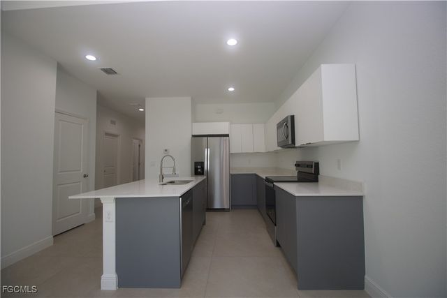 1260 MILWAUKEE BLVD 1260, Lehigh Acres, FL 33974