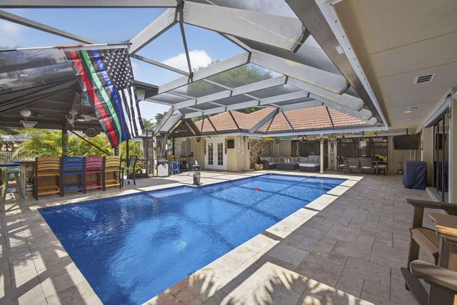 9 Kintyre Road, Palm Beach Gardens, FL 33418