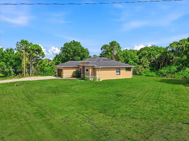 810 Sentinela Boulevard, Lehigh Acres, FL 33974