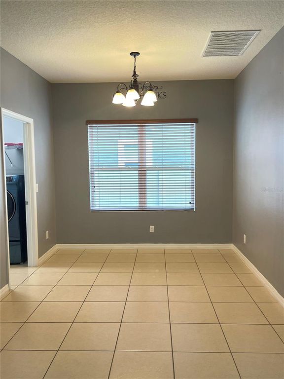 Image 11 of property listing at 12810 BOGGY VIEW DR, Orlando, FL 32824