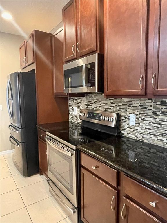 Image 9 of property listing at 12810 BOGGY VIEW DR, Orlando, FL 32824