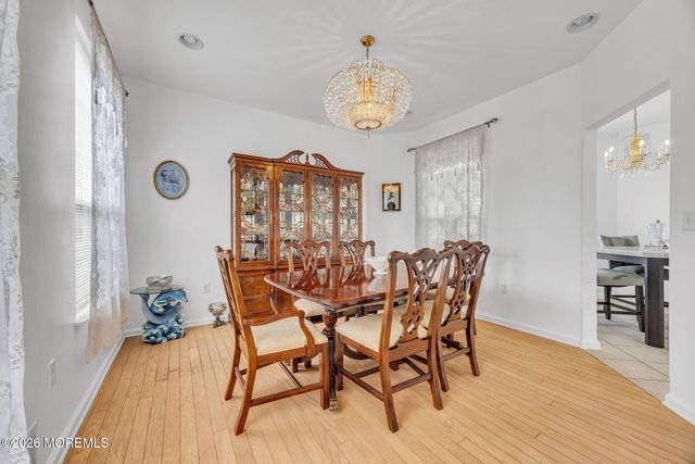 155 Point Of Woods Boulevard, Morganville, NJ 07751