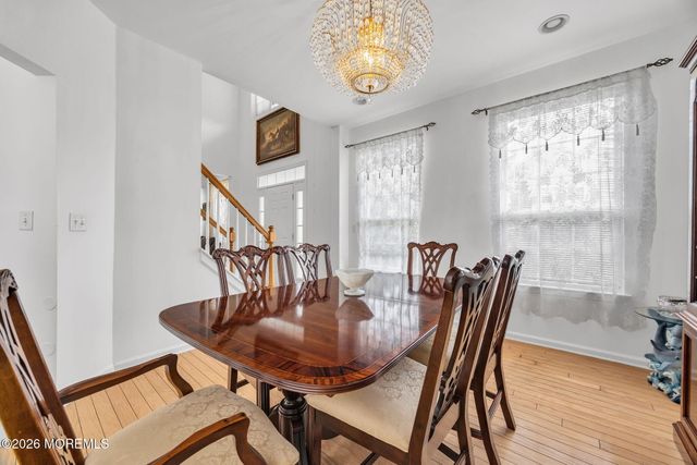 155 Point Of Woods Boulevard, Morganville, NJ 07751