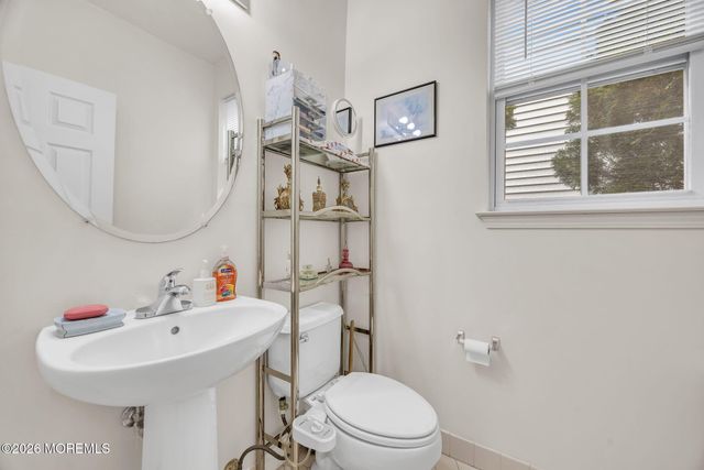 155 Point Of Woods Boulevard, Morganville, NJ 07751