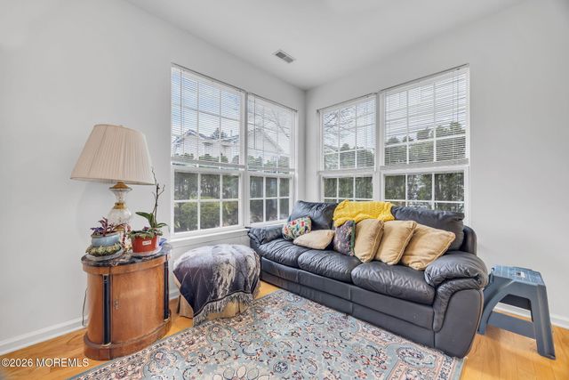 155 Point Of Woods Boulevard, Morganville, NJ 07751