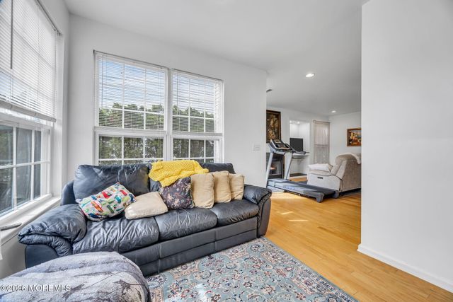 155 Point Of Woods Boulevard, Morganville, NJ 07751