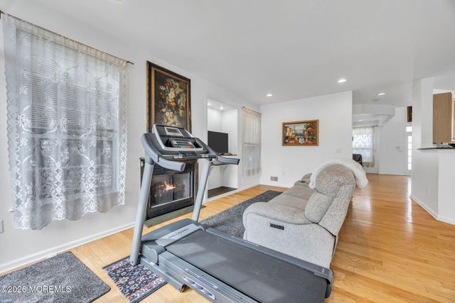 155 Point Of Woods Boulevard, Morganville, NJ 07751