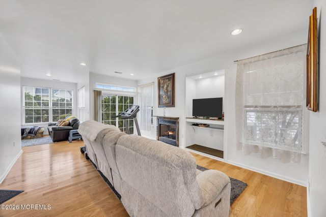 155 Point Of Woods Boulevard, Morganville, NJ 07751