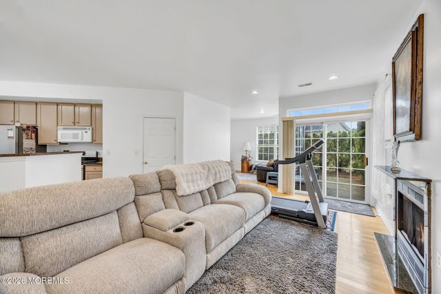 155 Point Of Woods Boulevard, Morganville, NJ 07751