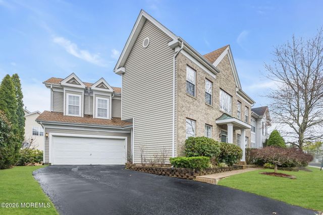 155 Point Of Woods Boulevard, Morganville, NJ 07751