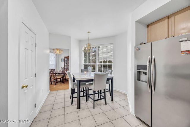 155 Point Of Woods Boulevard, Morganville, NJ 07751