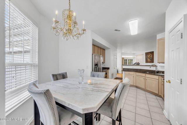 155 Point Of Woods Boulevard, Morganville, NJ 07751