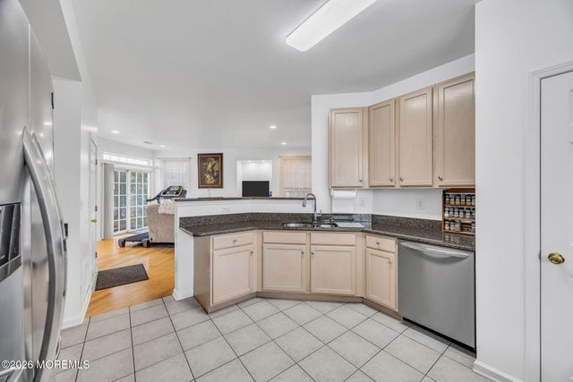 155 Point Of Woods Boulevard, Morganville, NJ 07751