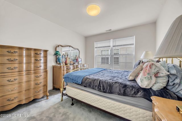 155 Point Of Woods Boulevard, Morganville, NJ 07751