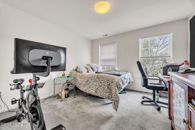 155 Point Of Woods Boulevard, Morganville, NJ 07751