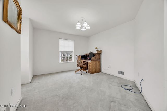 155 Point Of Woods Boulevard, Morganville, NJ 07751