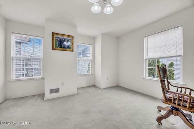 155 Point Of Woods Boulevard, Morganville, NJ 07751