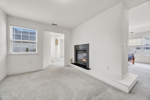 155 Point Of Woods Boulevard, Morganville, NJ 07751