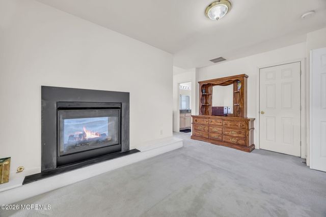 155 Point Of Woods Boulevard, Morganville, NJ 07751