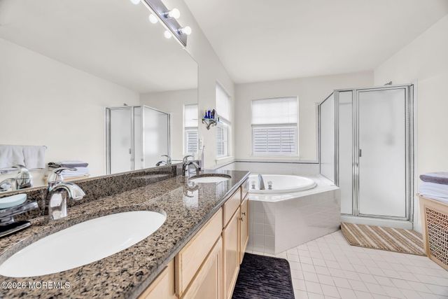 155 Point Of Woods Boulevard, Morganville, NJ 07751