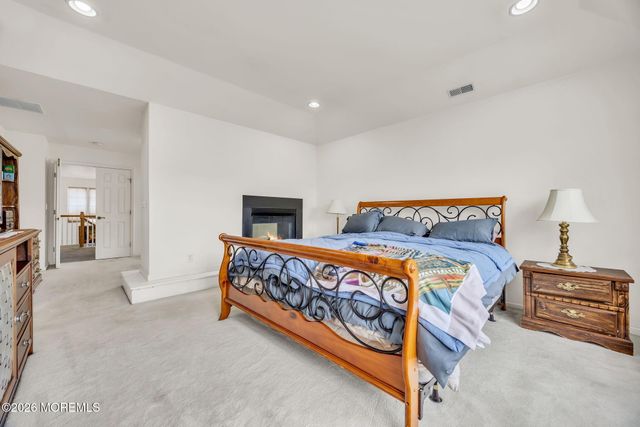 155 Point Of Woods Boulevard, Morganville, NJ 07751