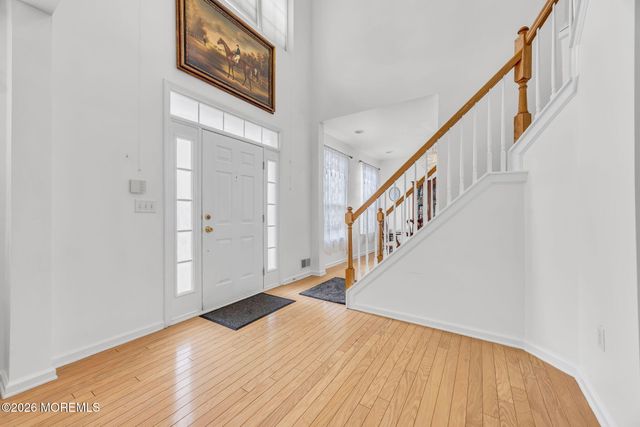 155 Point Of Woods Boulevard, Morganville, NJ 07751