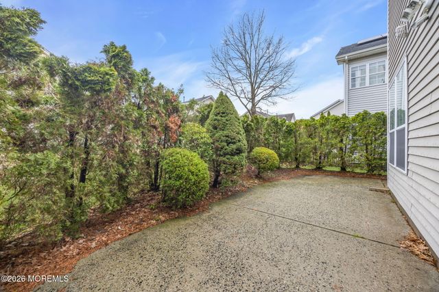 155 Point Of Woods Boulevard, Morganville, NJ 07751