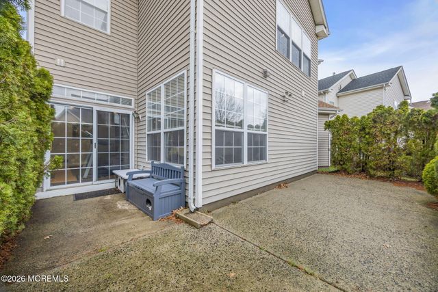 155 Point Of Woods Boulevard, Morganville, NJ 07751