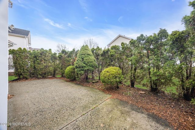 155 Point Of Woods Boulevard, Morganville, NJ 07751