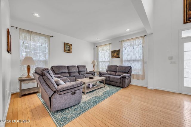 155 Point Of Woods Boulevard, Morganville, NJ 07751