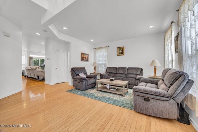 155 Point Of Woods Boulevard, Morganville, NJ 07751