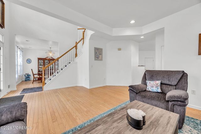 155 Point Of Woods Boulevard, Morganville, NJ 07751