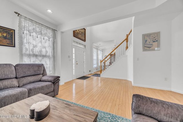 155 Point Of Woods Boulevard, Morganville, NJ 07751