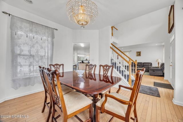 155 Point Of Woods Boulevard, Morganville, NJ 07751