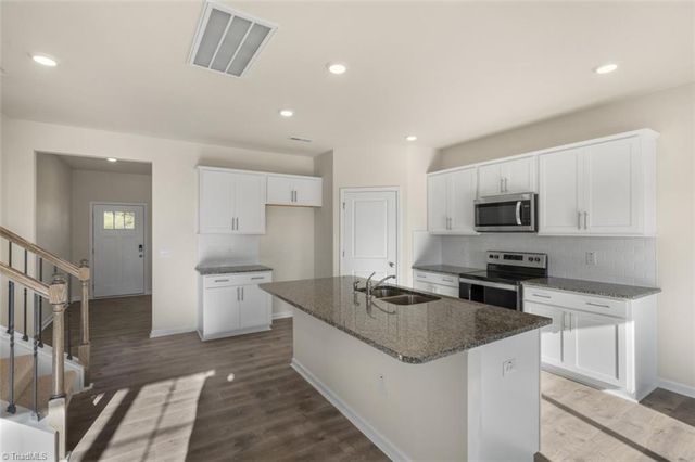 6549 Grogan Hill Road, Whitsett, NC 27377