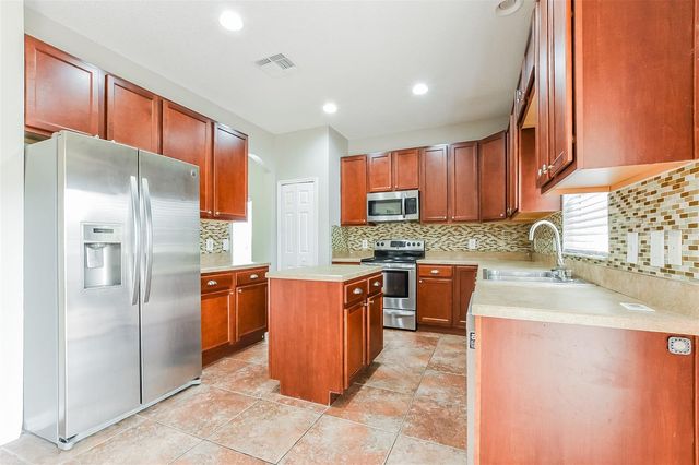 2043 HAMMOCK MOSS DRIVE, Orlando, FL 32820
