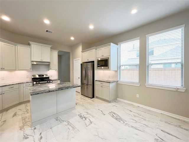 18426 Circle Bar Ranch Court, Cypress, TX 77433