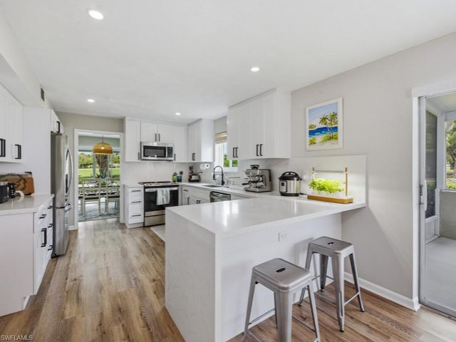 438 Bristle Cone LN 20, Naples, FL 34113