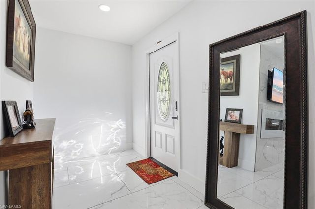 6005 Star Grass LN, Naples, FL 34116