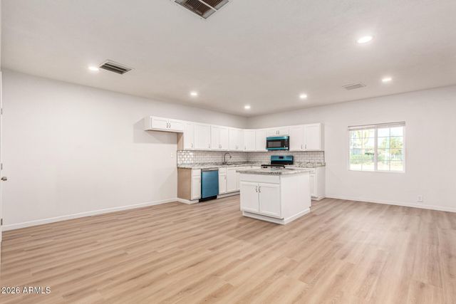 411 W BEALEY Avenue, Coolidge, AZ 85128