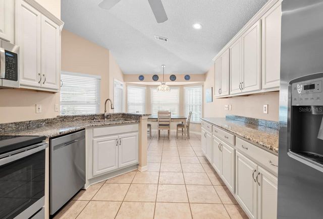 327 CALOOSA WOODS LANE, Sun City Center, FL 33573