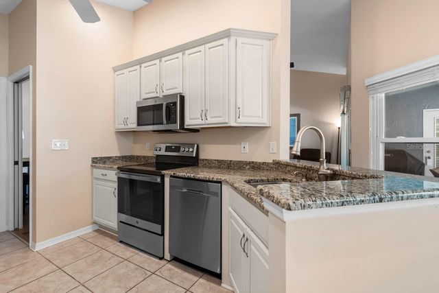 327 CALOOSA WOODS LANE, Sun City Center, FL 33573