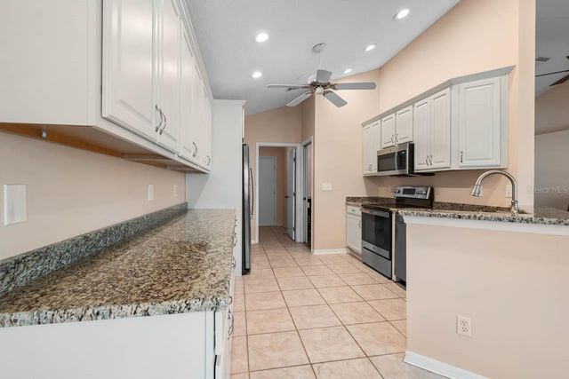 327 CALOOSA WOODS LANE, Sun City Center, FL 33573