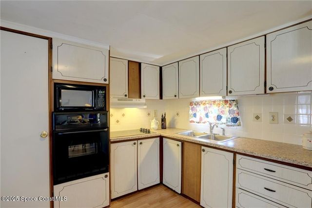 410 Osprey Drive, Barefoot Bay, FL 32976