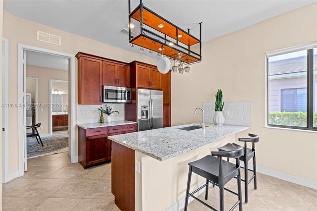 10915 Moore Dr, Parkland, FL 33076