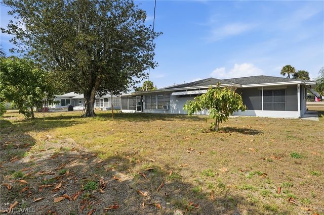 1406 Grandale ST, Lehigh Acres, FL 33936