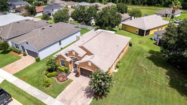 5911 WHISPER PINE DRIVE, Leesburg, FL 34748
